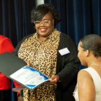 Woman receiving an award